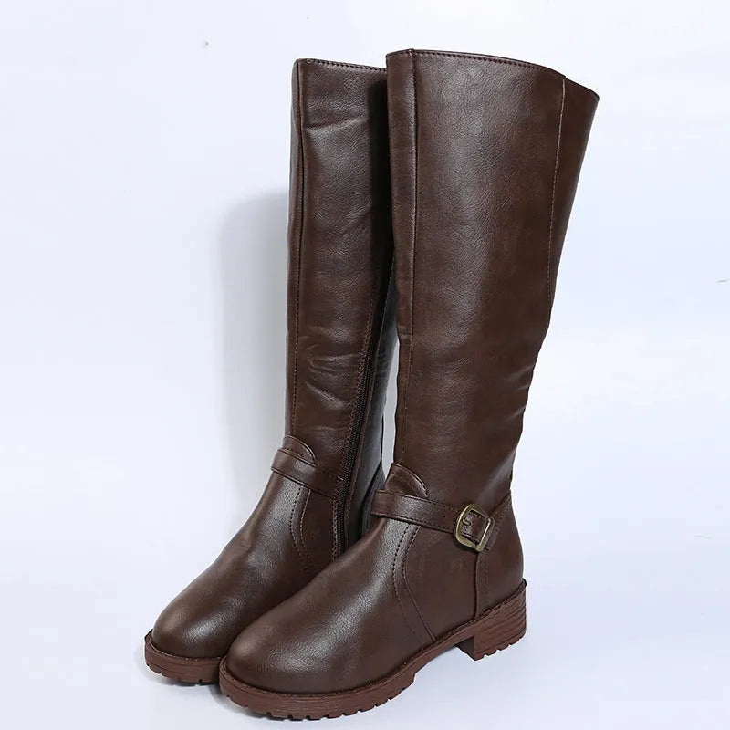 Yellow women's knight boots with a square heel, round toe, and buckle detail on a high calf shaft.