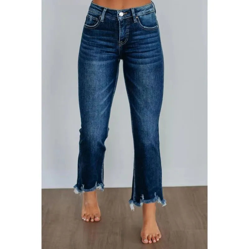 Women's solid colour cotton denim jeans with hand-worn detailing in dark blue and light blue.