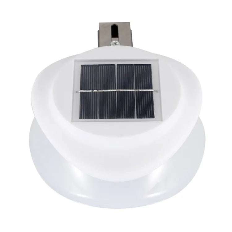 Solar-powered outdoor garden wall lamp with Southeast Asian design on fence