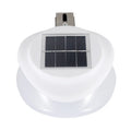 Solar-powered outdoor garden wall lamp with Southeast Asian design on fence
