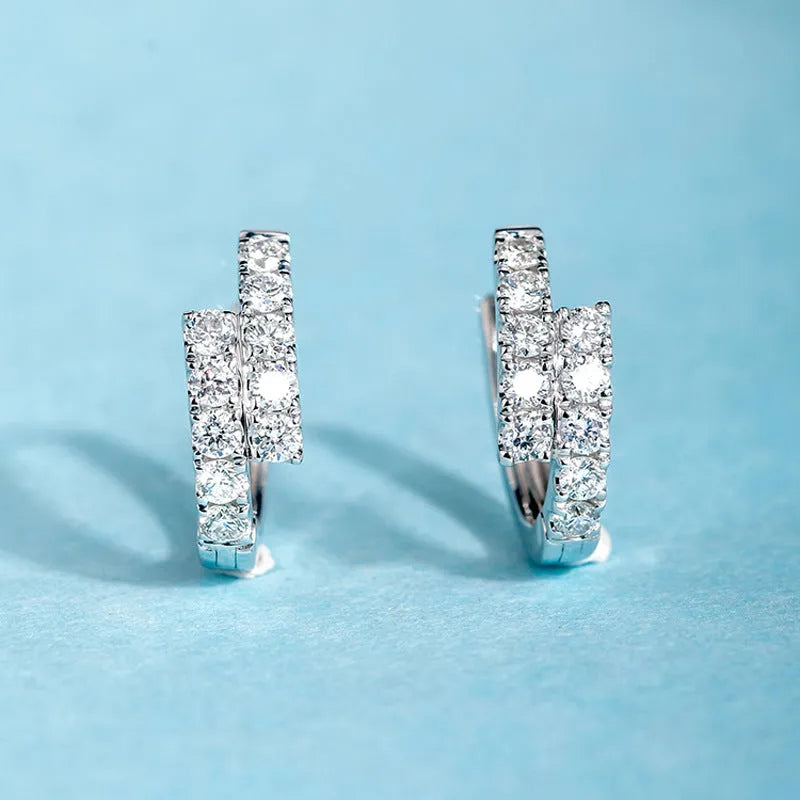 Small diamond ear clip earrings in white gold colour copper with geometric ring design, one pair