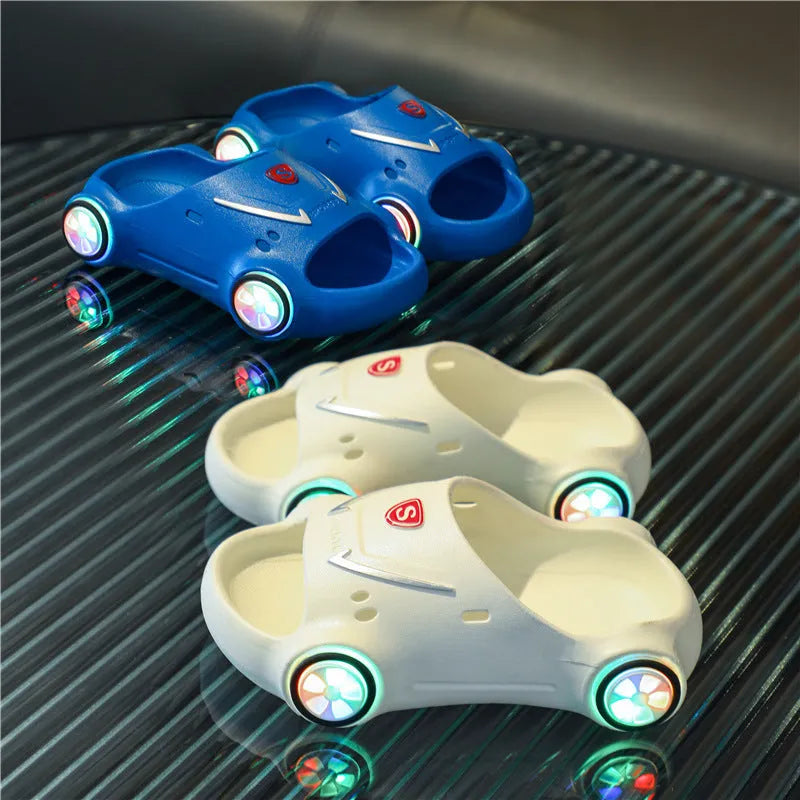 Kids glowing cartoon car sandals with anti-slip sole, sizes 20-35, in illuminated blue, black, white, yellow, and pink