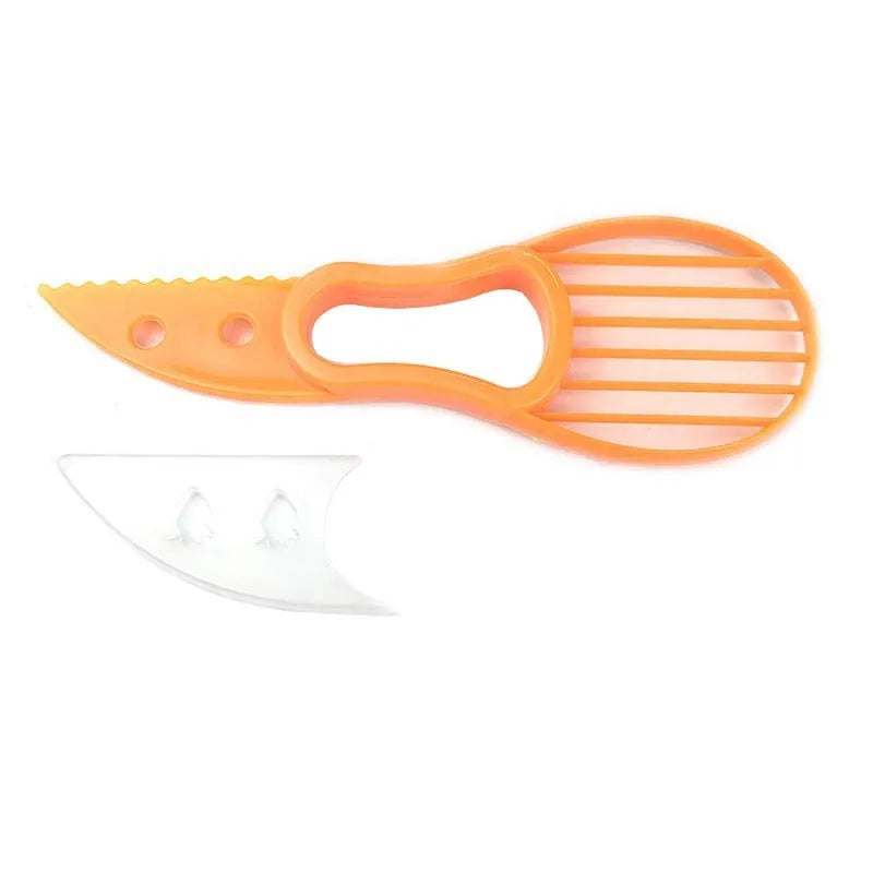 Multifunctional avocado knife in green and orange polypropylene for slicing and peeling fruit