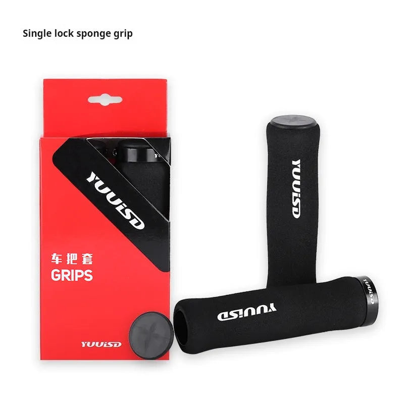 A pair of soft sponge mountain bike handlebar grips in biange colour, showcasing their lightweight 41g design.