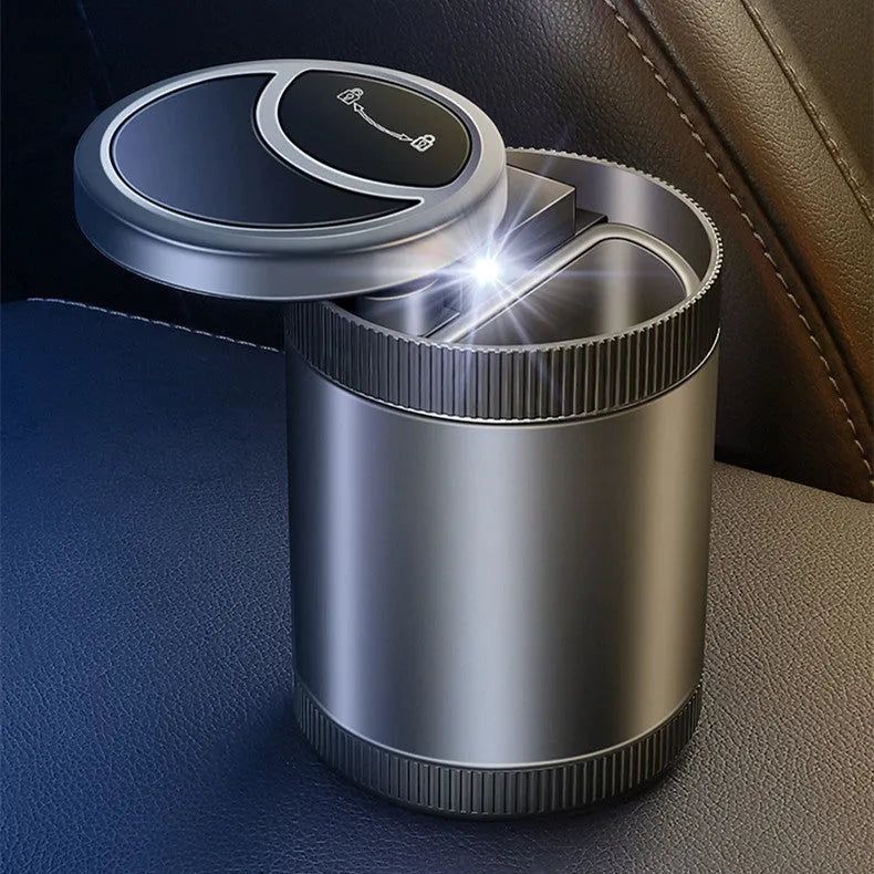 Automatic vehicle ashtray with USB cable and rotating lid in grey colour.