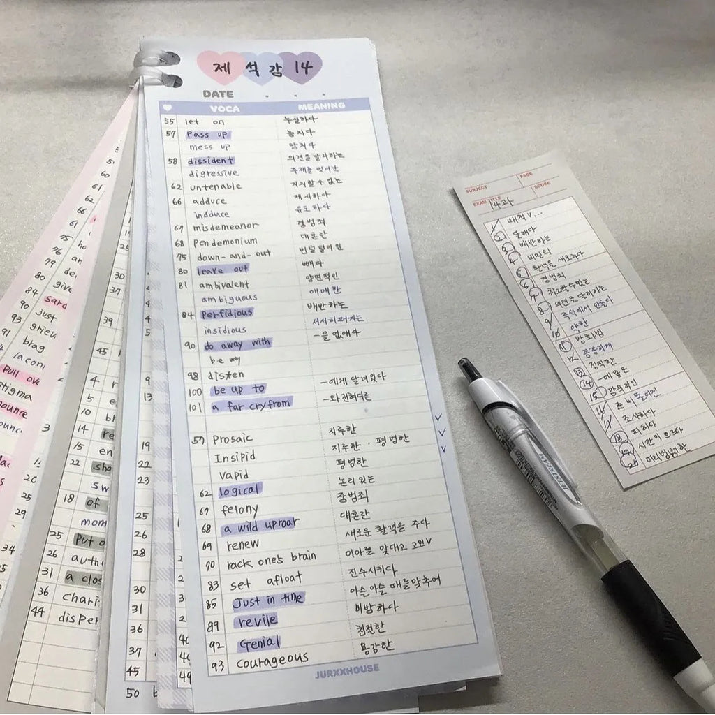 B5 half-size notepad with vertical English words printing in pink, purple, and blue cover colours.
