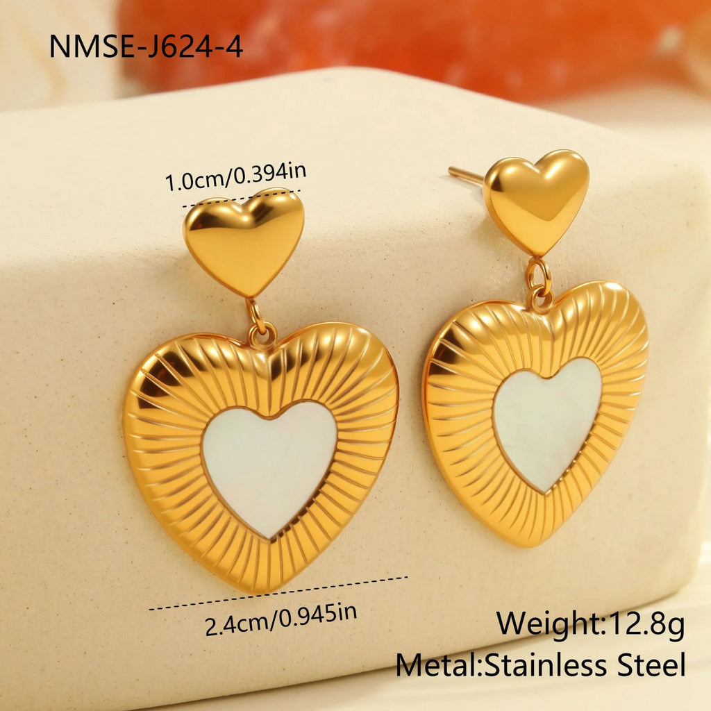 Gold electroplated heart-shaped earrings with fritillary design on stainless steel