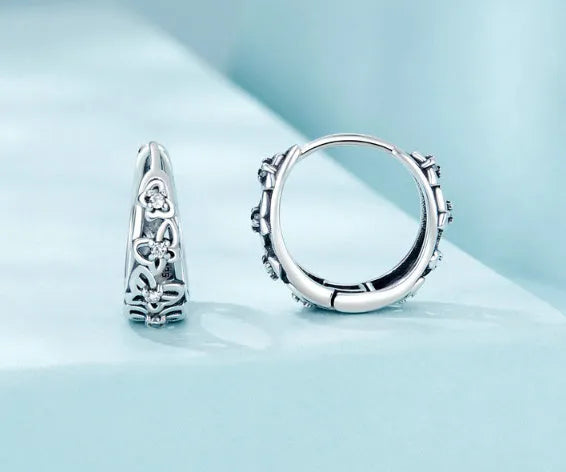 Retro hollow butterfly sterling silver earrings with zircon detail, showing 14mm height.