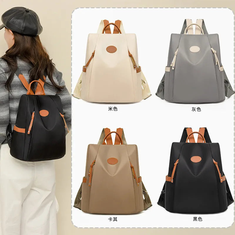 Waterproof Oxford cloth anti-theft travel backpack in black with sandwich pocket and zipper compartments