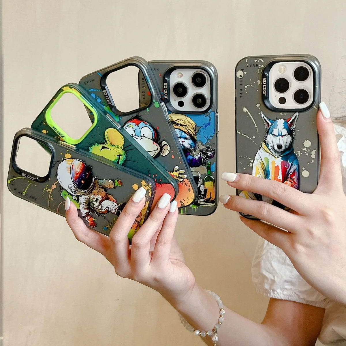 Drop-resistant phone case in TPU and PC for iPhone with anti-fingerprint finish, shown in Astronaut design.