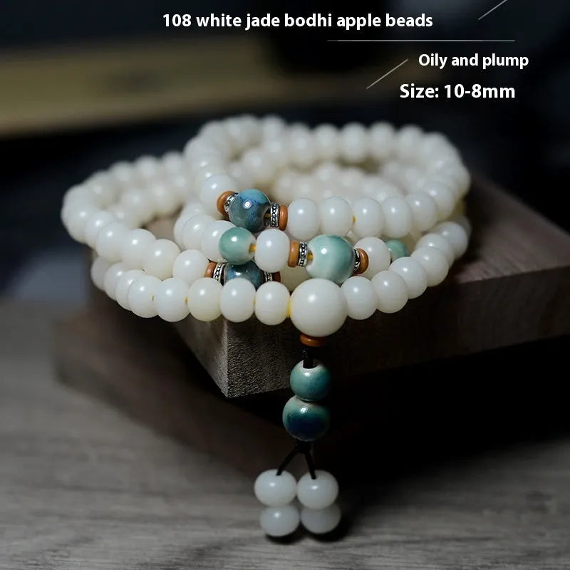 White jade bodhi seed bracelet with 108 flat round beads in 7x9mm and 8x10mm sizes
