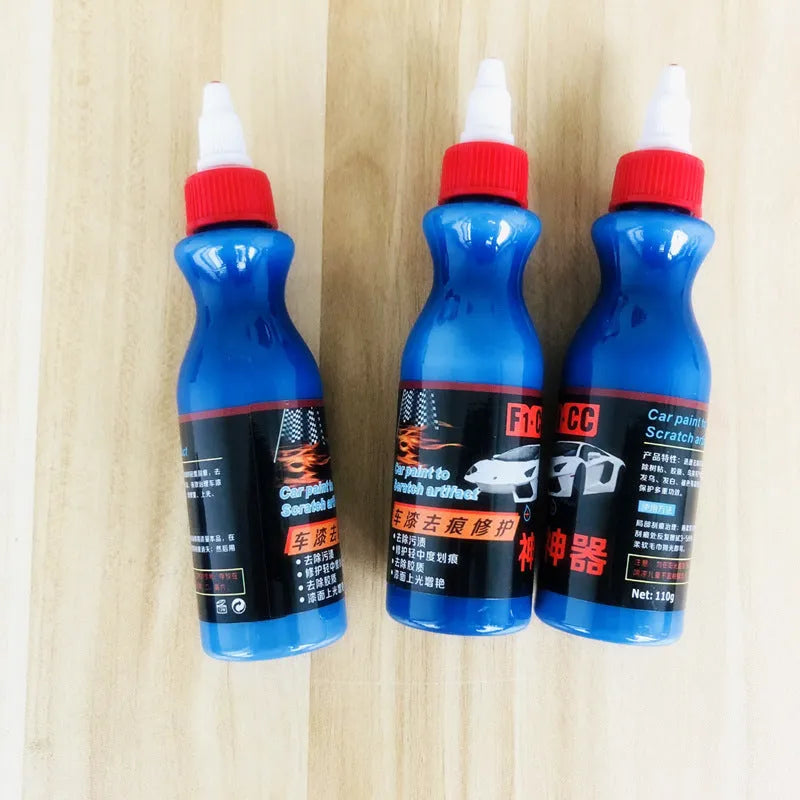 Small blue car wiping tool with scratch repair agent bottle for automotive paintwork touch-up applications