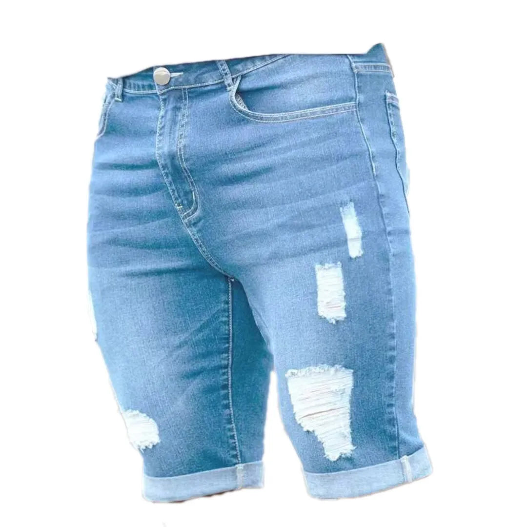 Men's sky blue denim shorts with distressed multi-hole design and straight leg cut