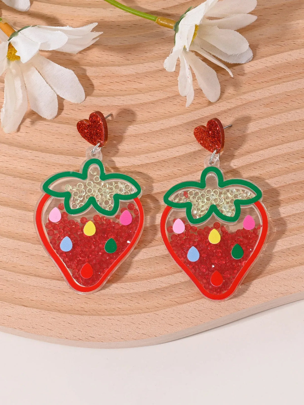 Set of acrylic earrings shaped like cherry, strawberry, watermelon, pineapple, coconut, cake, and ice cream.