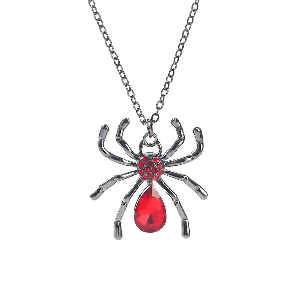 Gothic Halloween necklace with electroplated alloy pendant showing bat, spider, or cross design on a metal chain.