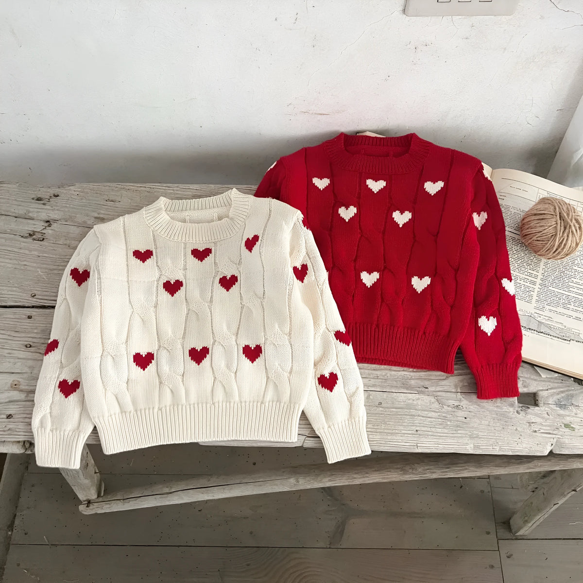 Cotton round neck pullover for baby in red colour with long sleeves on white background