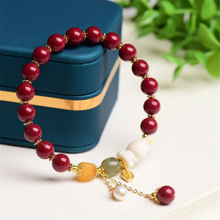 Tian Yu natural cinnabar bracelet with rabbit motif in traditional Chinese style
