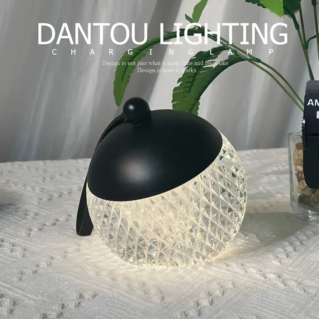 Portable dimmable desk lamp with modern minimalist design in chrome finish