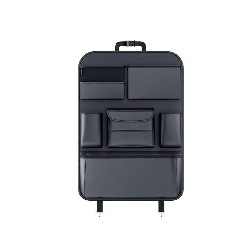 Black leather car seat back storage hanging bag with carrying handle shown attached to vehicle seat