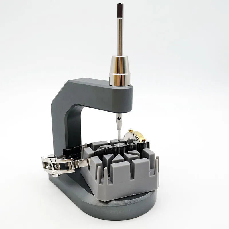 Silver tool steel press strap removal tool for watches, jewellery, and electronics.