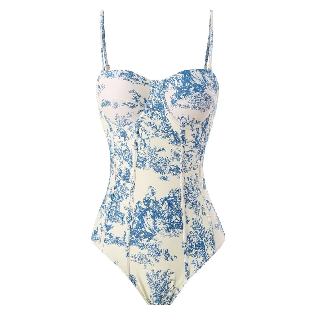 Women's blue one-piece swimsuit set with matching gauze skirt on a size chart