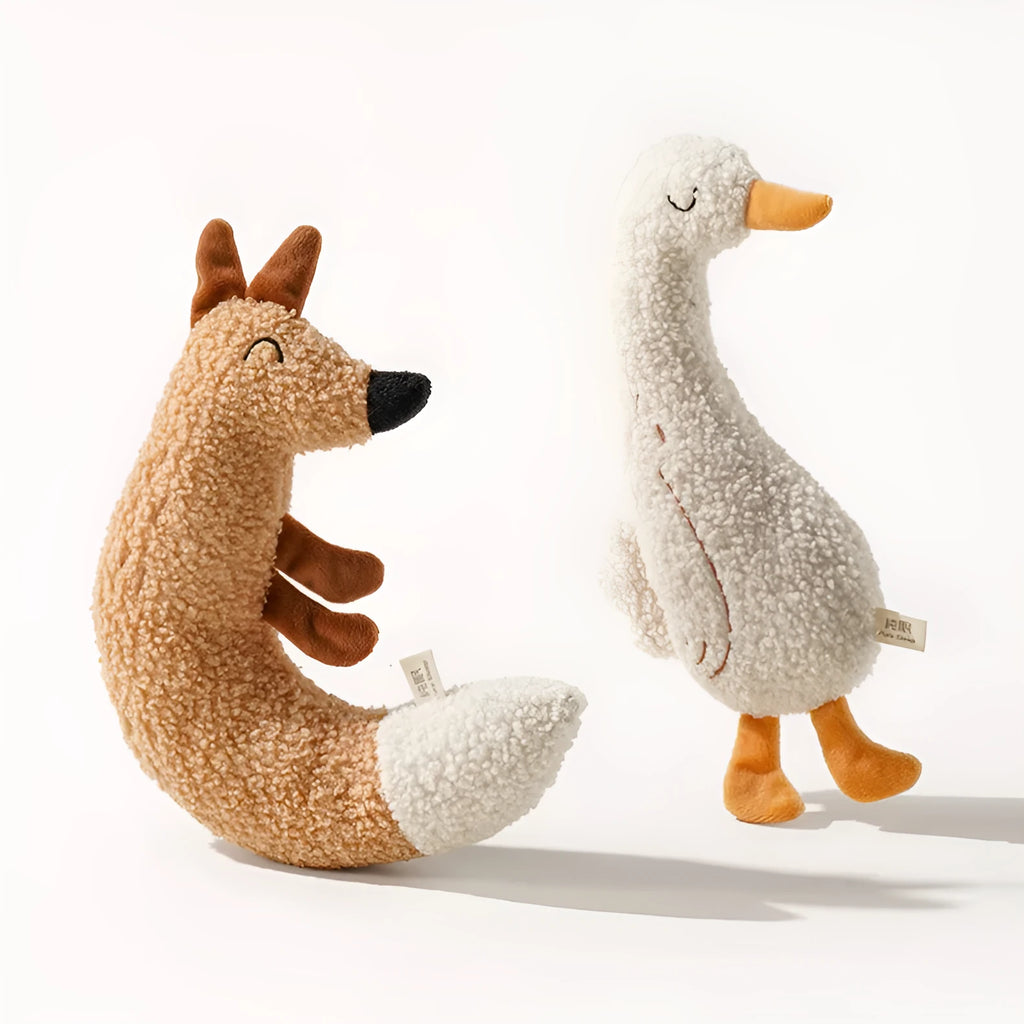 Cartoon dog chew toy in fox or duckling design with crinkle sound feature