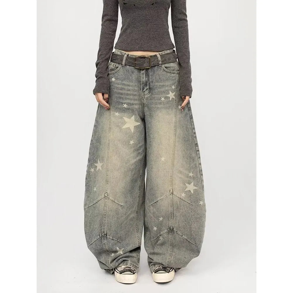Men's blue loose fit jeans with vintage washed, distressed and grey splatter finish, mid-rise waist and long pant length.