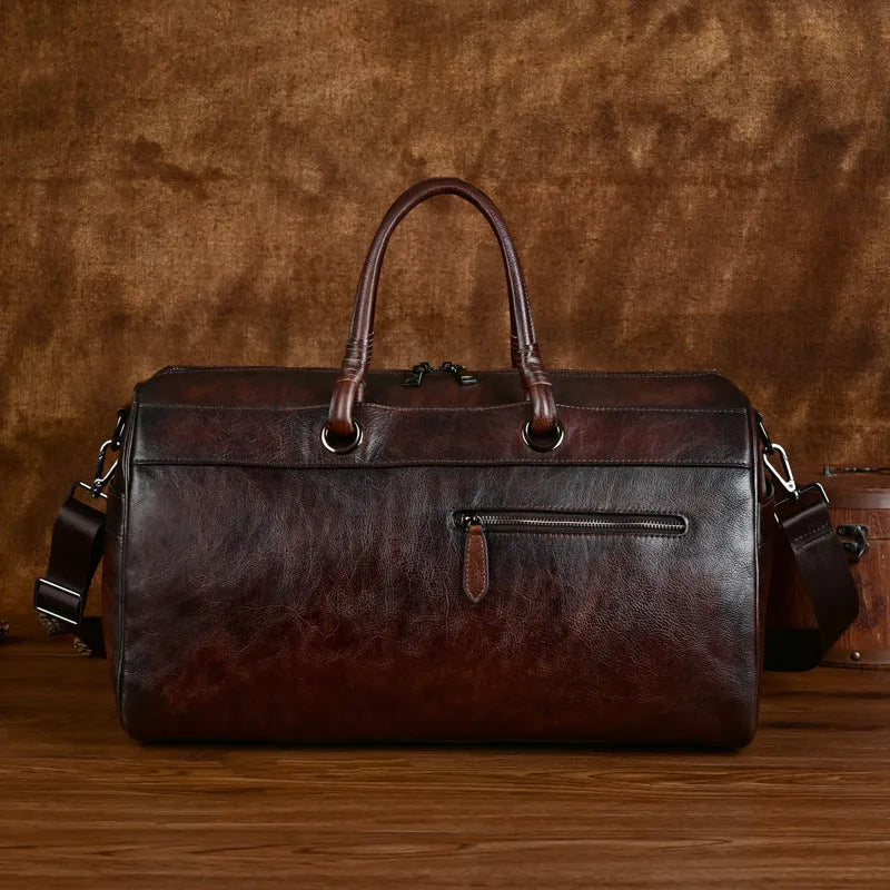 Handmade retro leather bag in vintage brown with below 20L capacity
