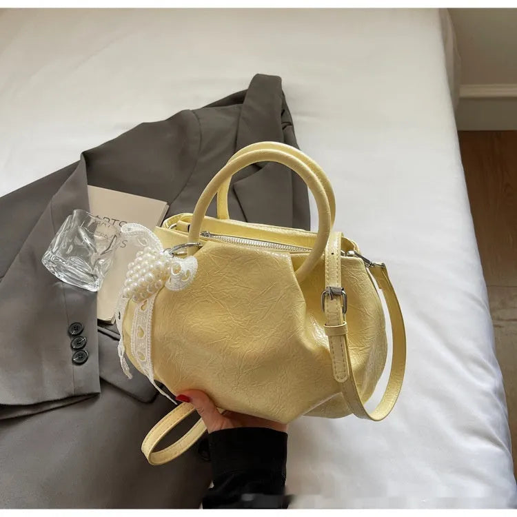 PU cloud shoulder bag in solid colour with bucket shape and outer slit pocket
