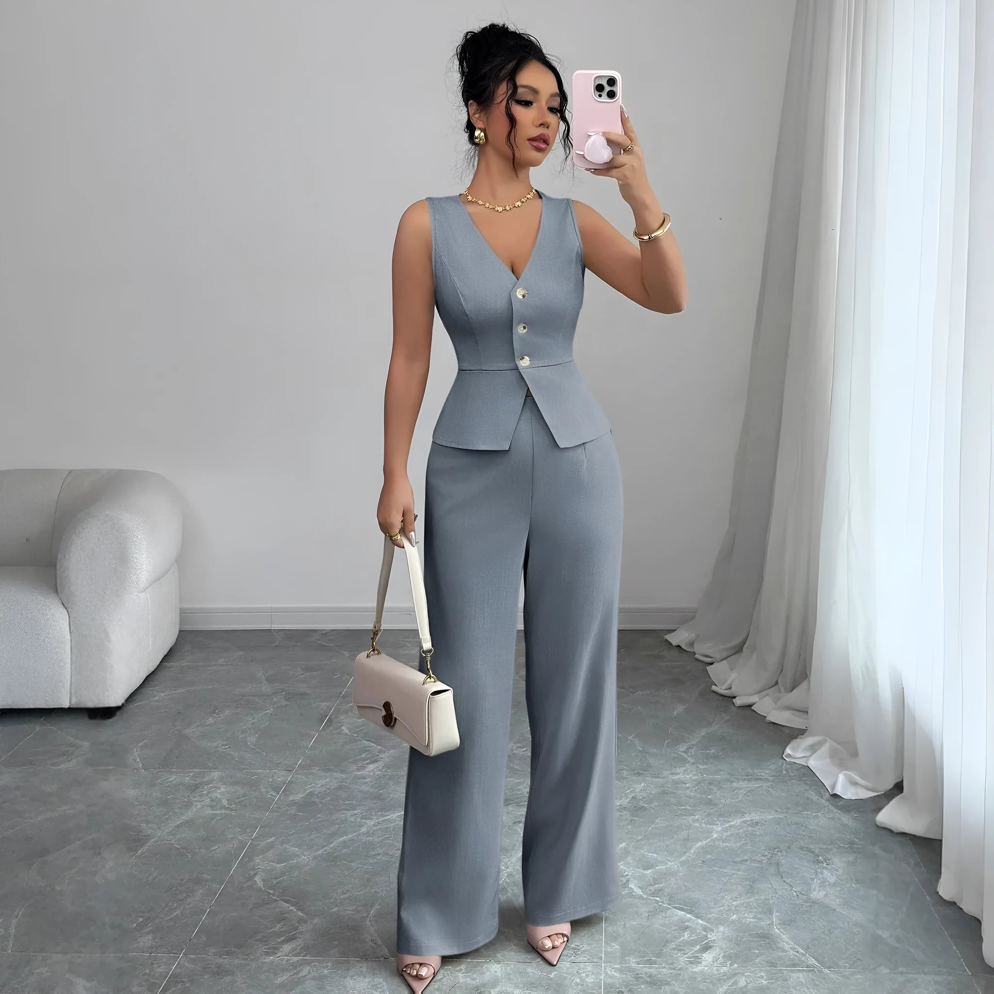 Women's solid colour sleeveless vest and high-waist trousers two-piece set in a casual style.