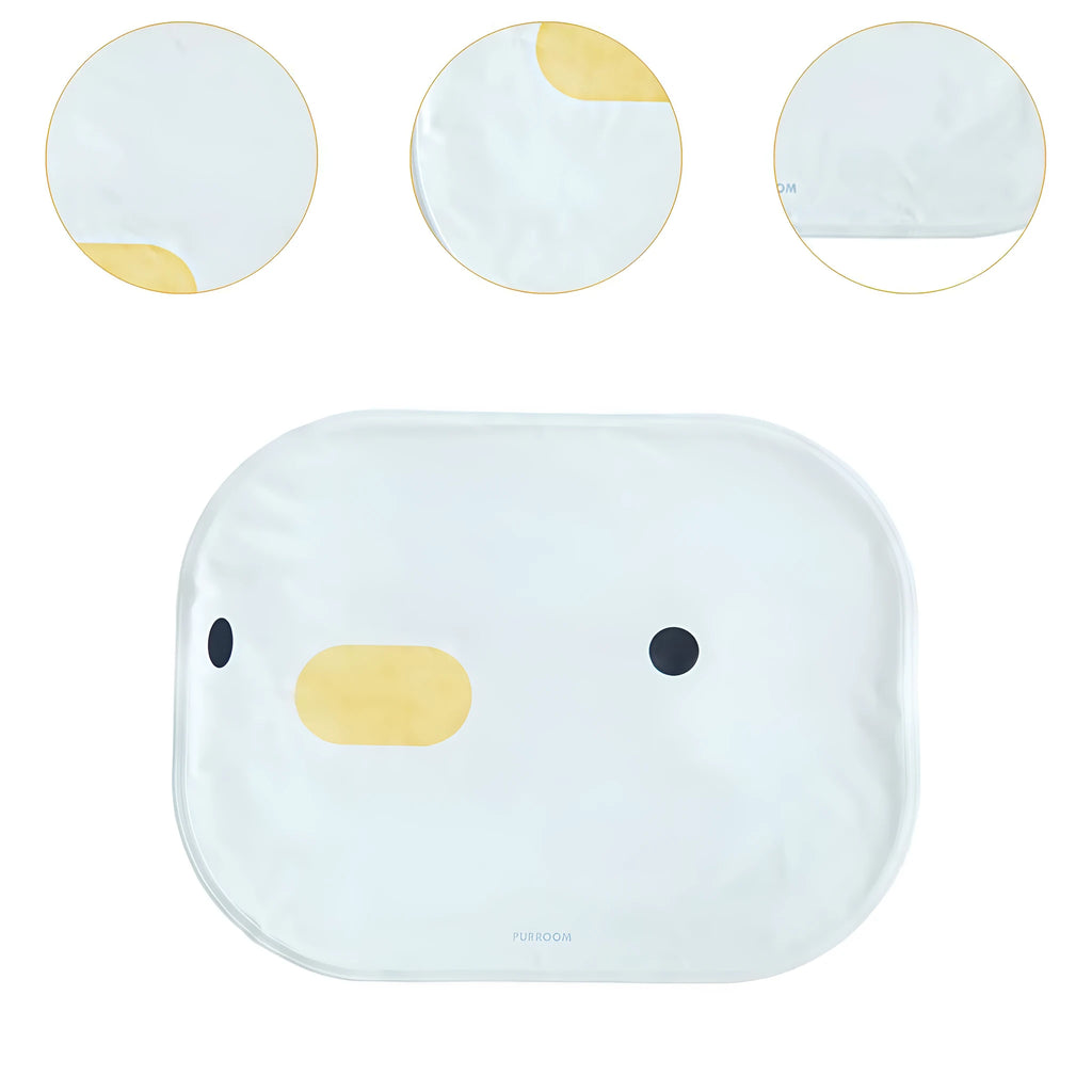 Washable chick-pattern pet cooling mat for dogs and cats on a floor