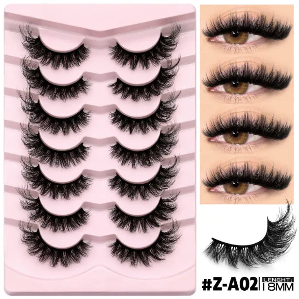 Box of artificial fibre false eyelashes in a natural long thick style with a tube of adhesive glue