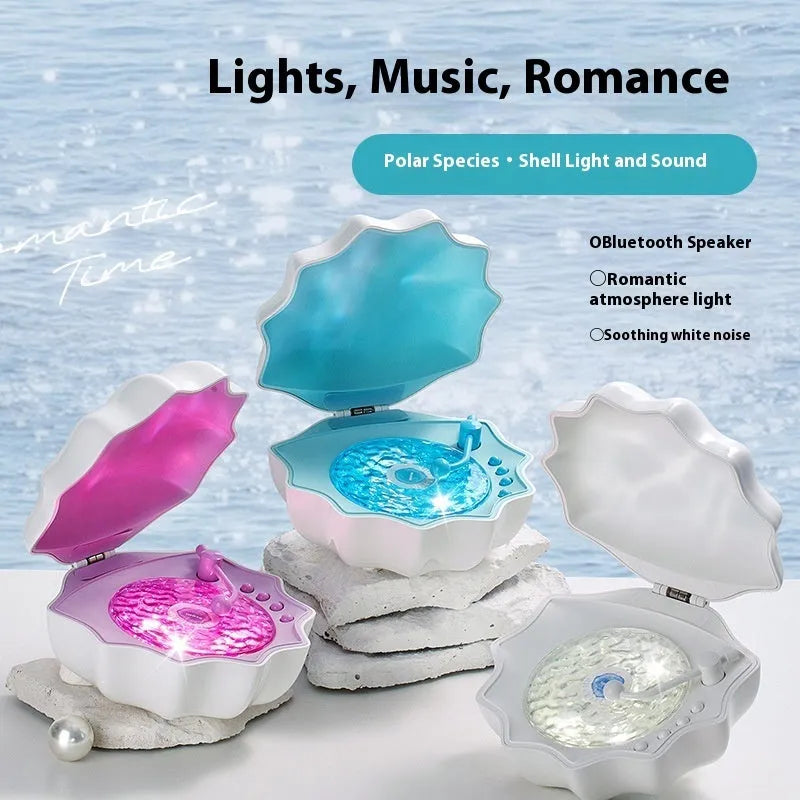 Wireless mini Bluetooth shell light stereo speaker with wave light in three colours for desktop outdoor home use