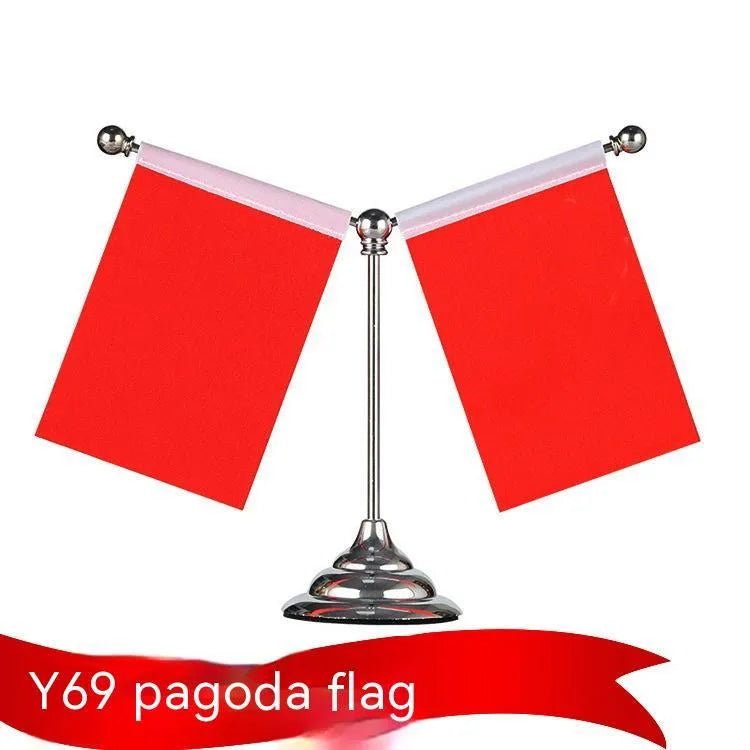 Adjustable metal telescopic rod decoration with a coloured polyester flag on a stand, shown on a car dashboard.