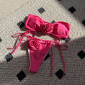 Rose red women's tube top bikini set with drawstring straps and solid colour split briefs.