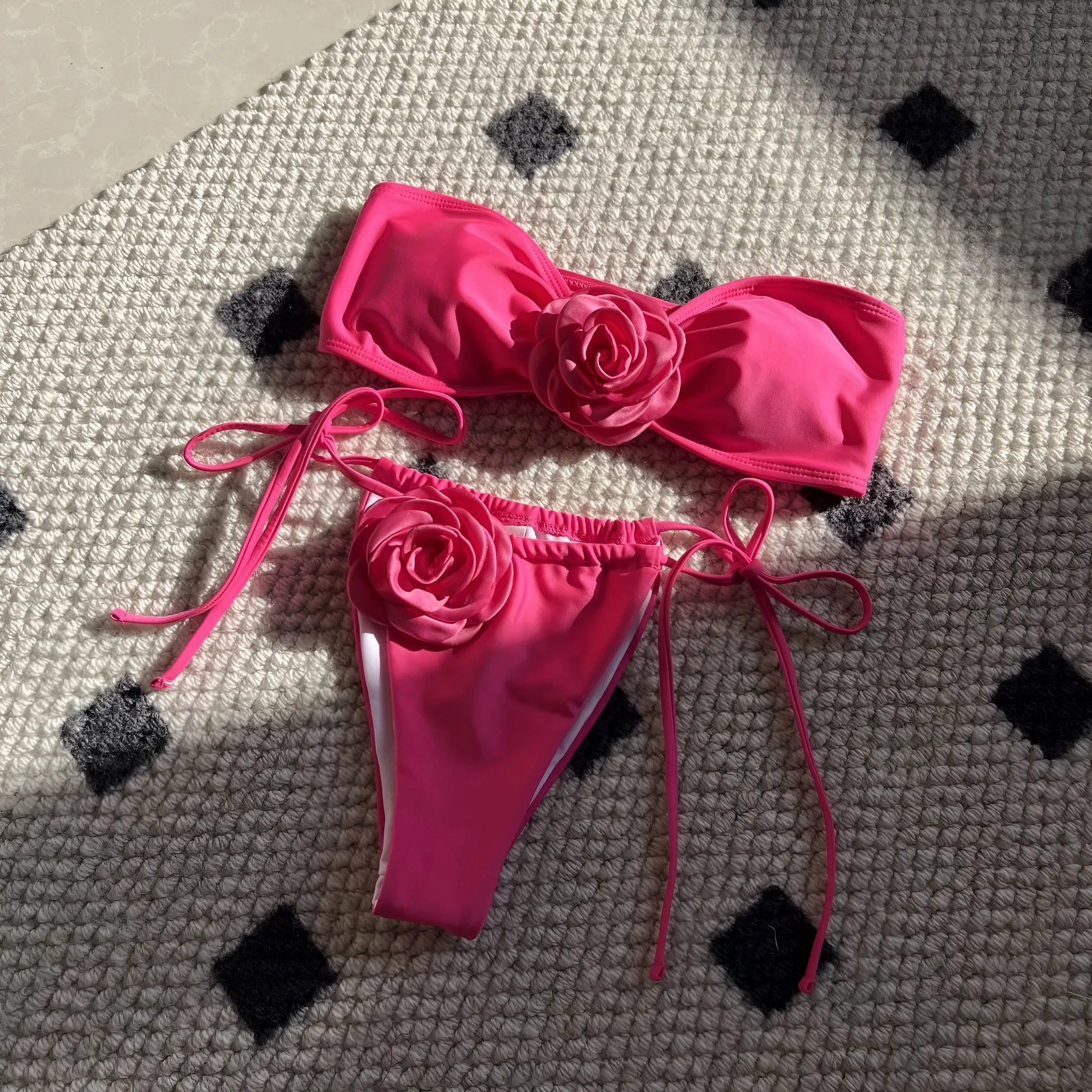 Rose red women's tube top bikini set with drawstring straps and solid colour split briefs.