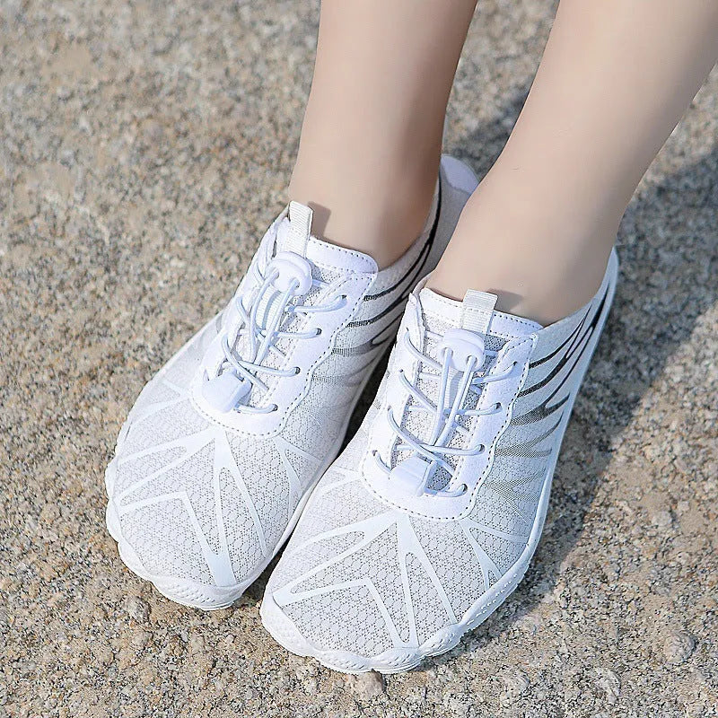 Breathable non-slip running shoes in black and white colour options, showing front lace-up design.