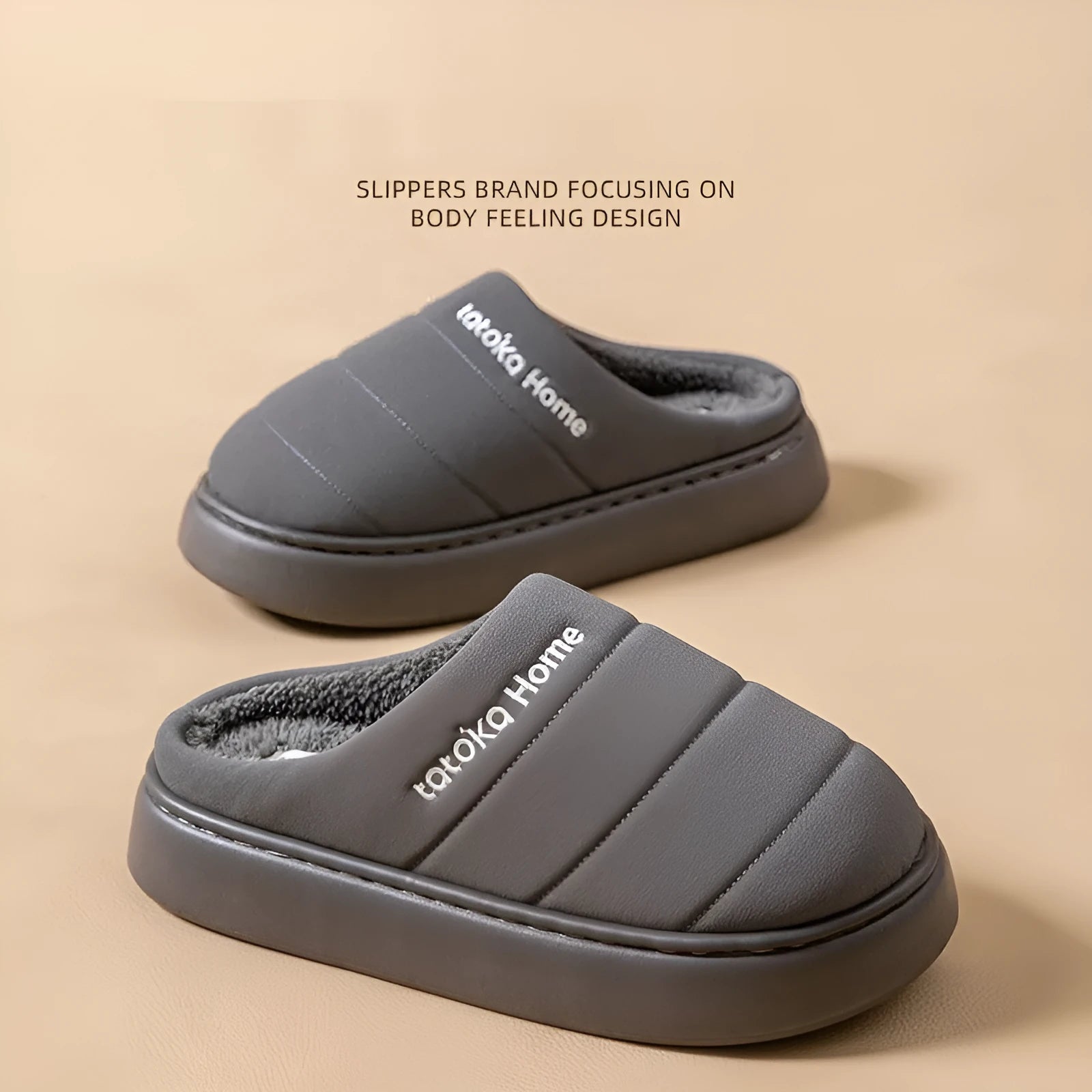 Pair of khaki fleece-lined cotton slippers with round toe and flat platform sole