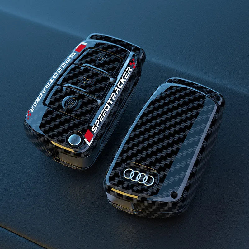 Carbon fibre style car key cover with mirror elements in carbon and white colours