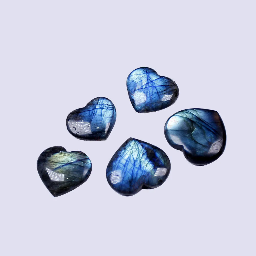 Natural blue pulled feldspar pendant with a geometric heart-shaped handle design on a white background.
