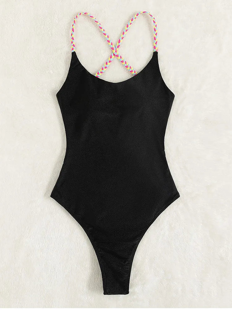 Black backless one-piece swimsuit with sleeveless design, made from nylon fabric
