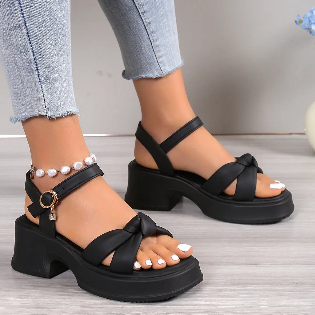 Women's black thick heel slippers with round toe and button closure