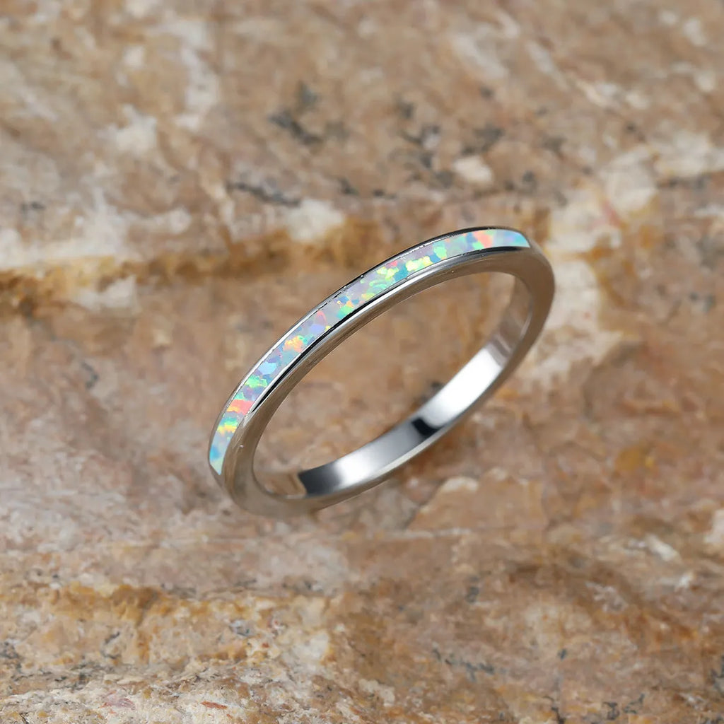 Copper ring with round blue opal stone, geometric simple design