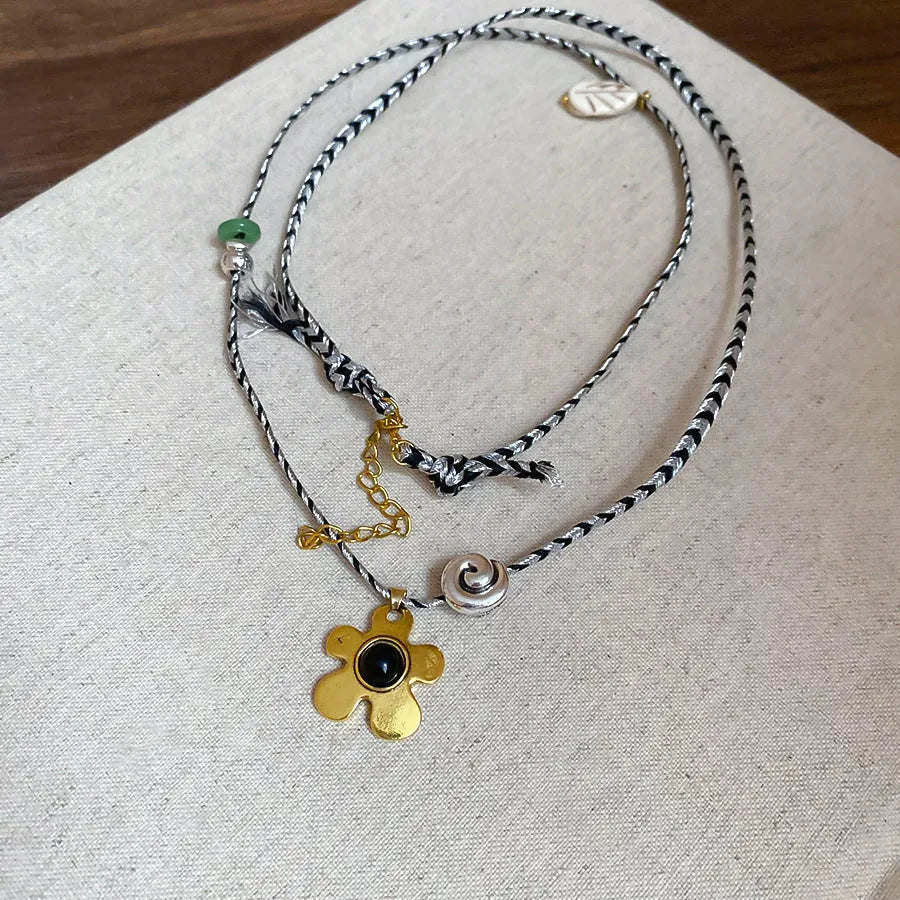 Stone shell beaded flower pendant necklace on adjustable alloy chain in silver-black-red colour
