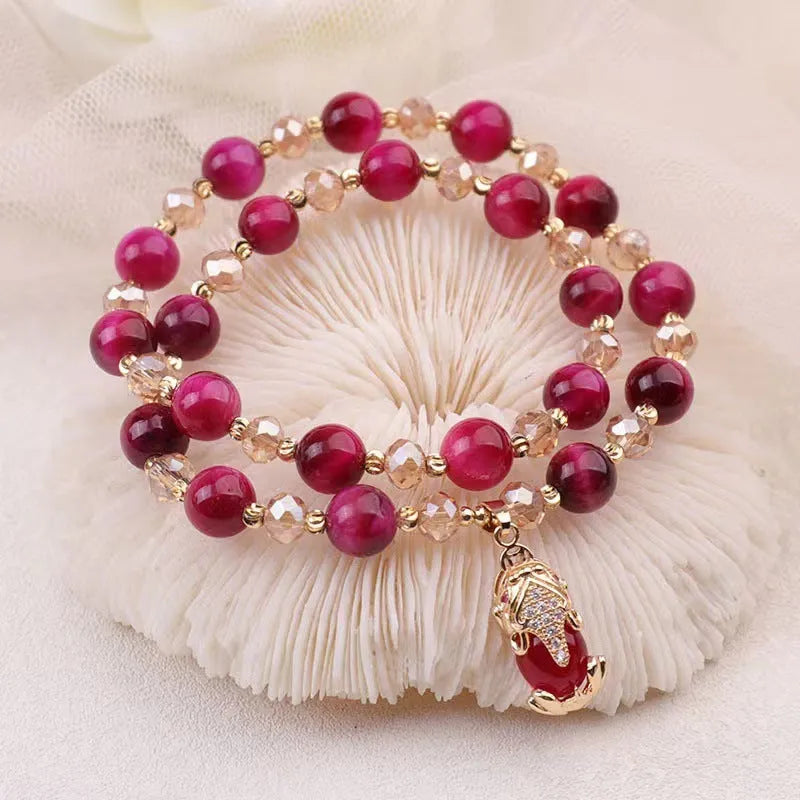 Handmade natural Tigereye stone bracelet with chain design and animal motifs