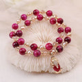 Handmade natural Tigereye stone bracelet with chain design and animal motifs
