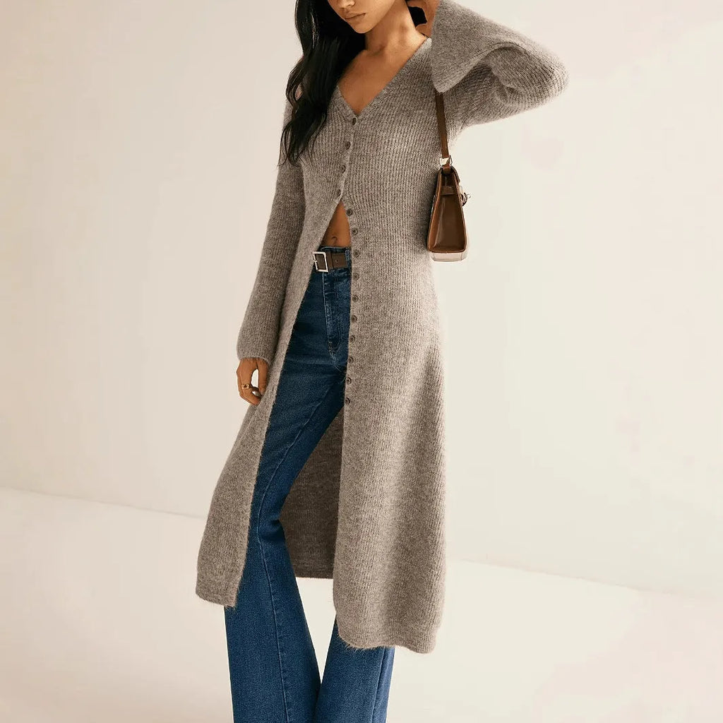 Khaki coloured long sleeve button-front cardigan with a French retro style on a hanger.