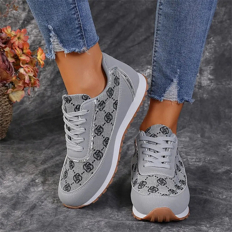 Flower print lace-up sneakers in camel with round toe and rubber sole