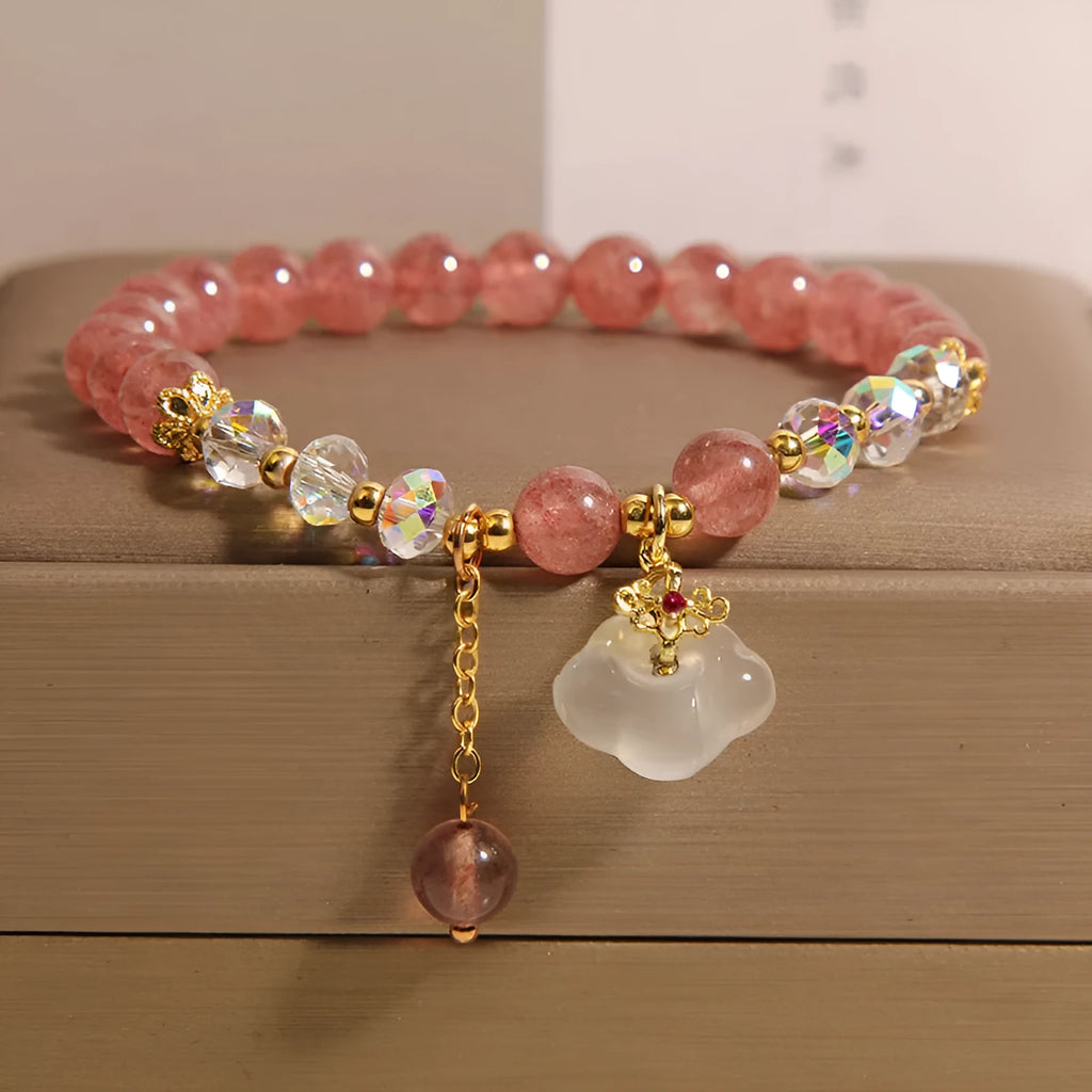 Women's natural crystal bracelet with strawberry quartz and white agate beads featuring auspicious cloud design