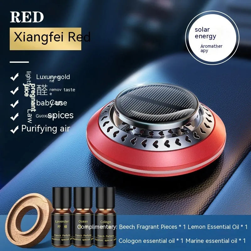 Solar-powered aluminium car air purifier and essential oil diffuser unit on a car dashboard